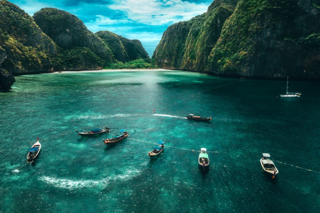 Aerial view of Maya bay. Maya Bay is the crown jewel of Phi Phi Islands in southern Thailand. It is situated in the Hat Noppharat Thara – Mu Ko Phi Phi National Park in Thailand.